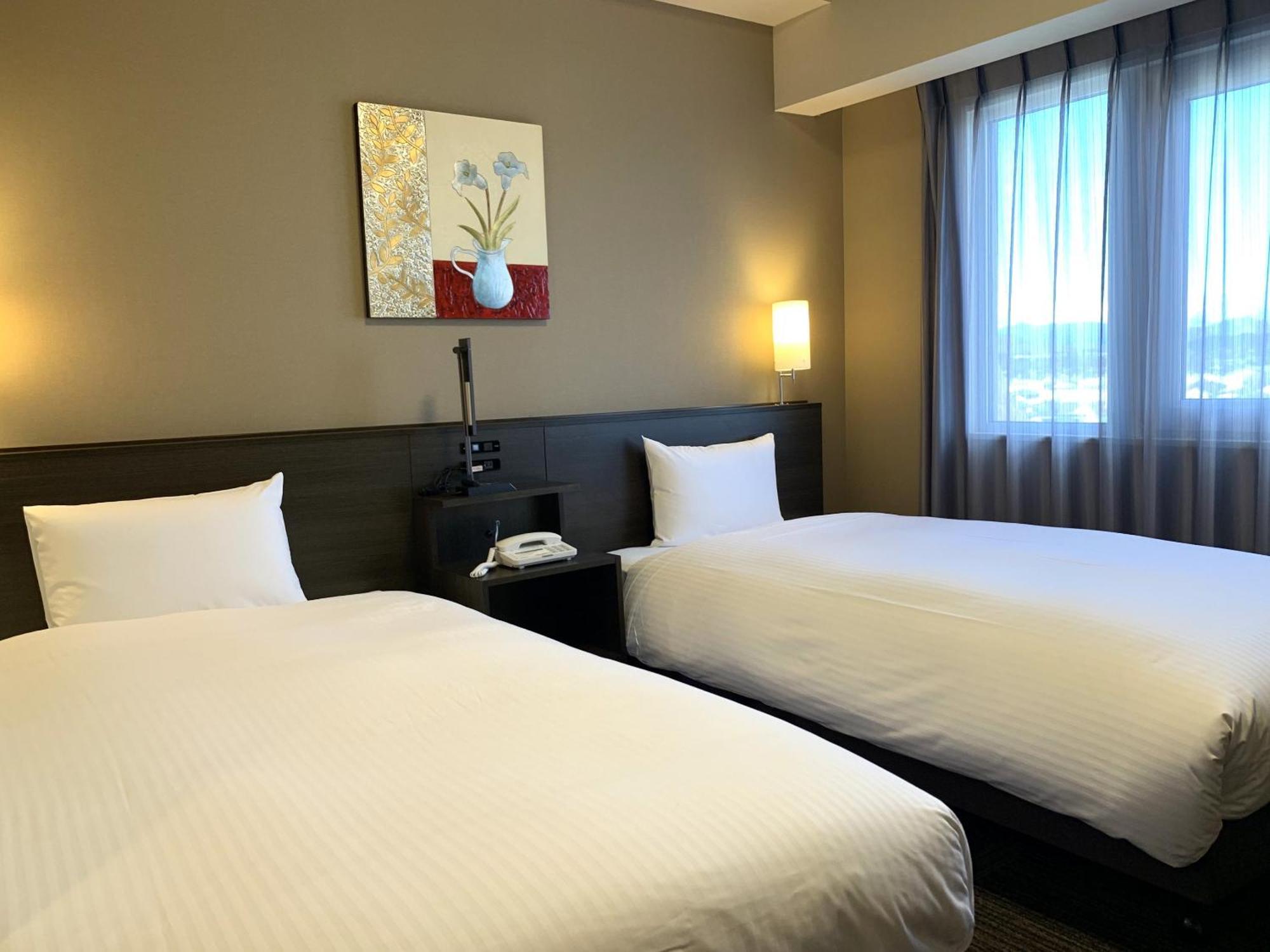 Hotel Route-Inn Isesaki Inter Esterno foto