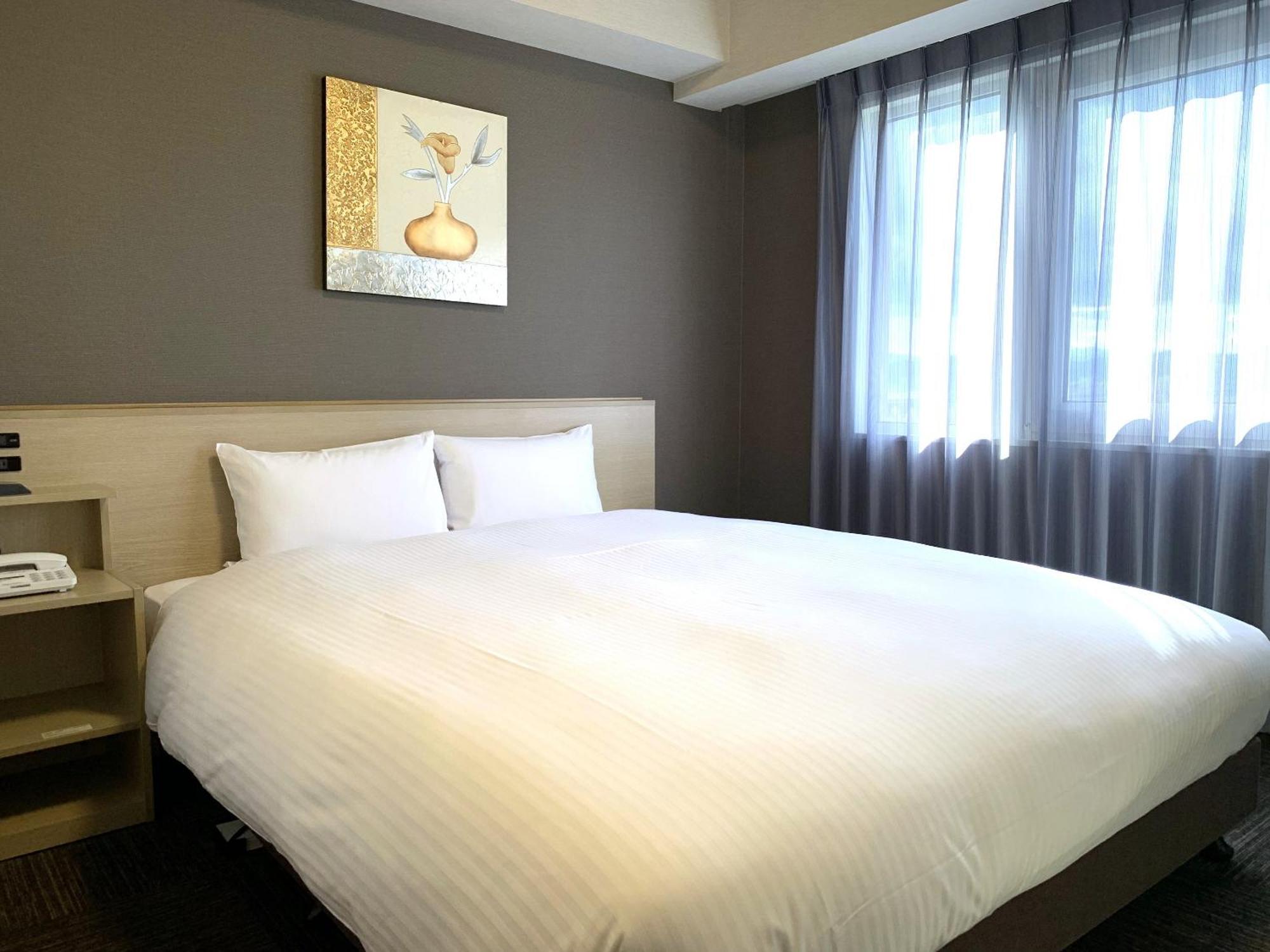 Hotel Route-Inn Isesaki Inter Esterno foto